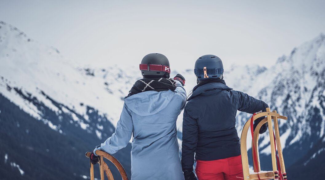 2 sledders on mountain station  | © Davos Klosters Mountains 