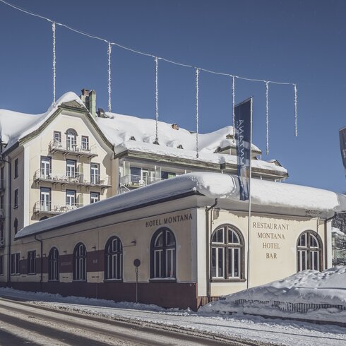 Hotel Montana with wintry exterior view | © Davos Klosters Mountains